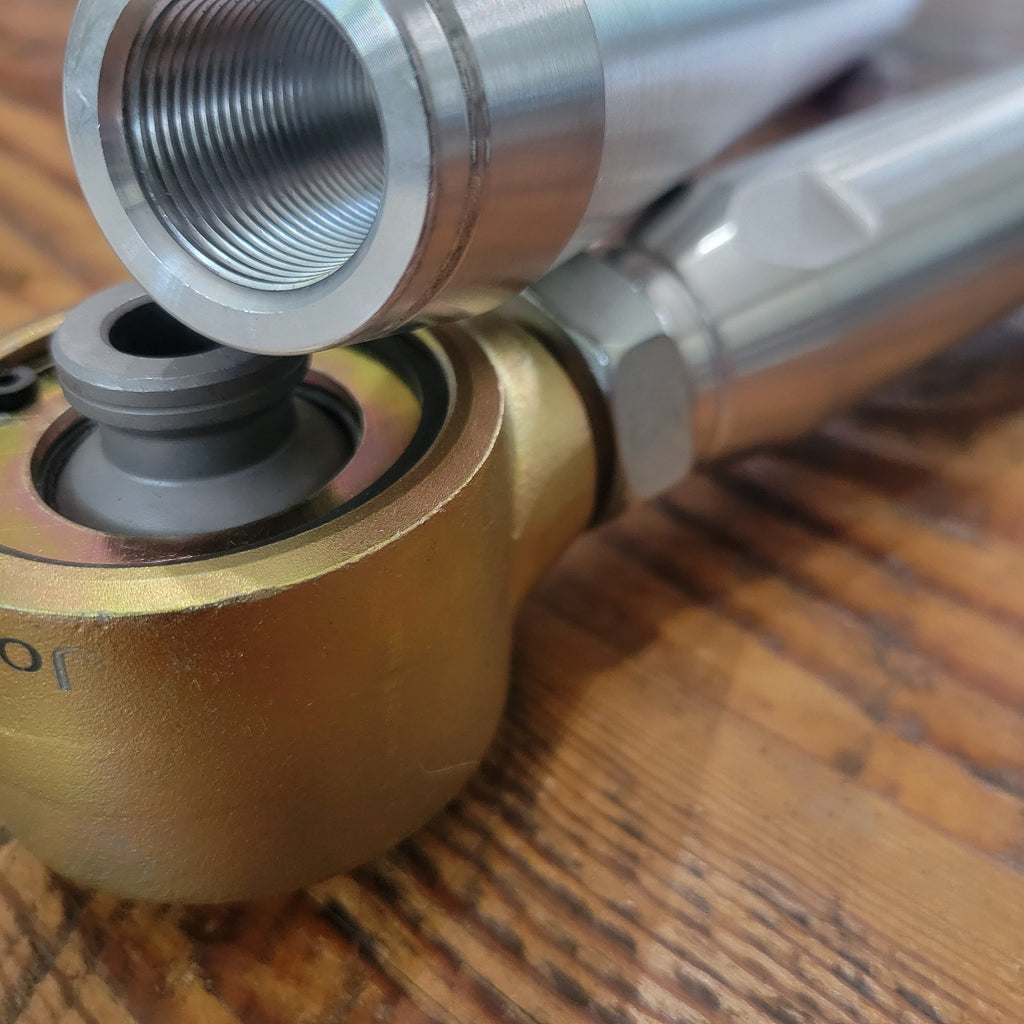 Overland Custom Design lower control arms for 3rd Gen Toyota 4Runner, showing durable metal construction and mounting points