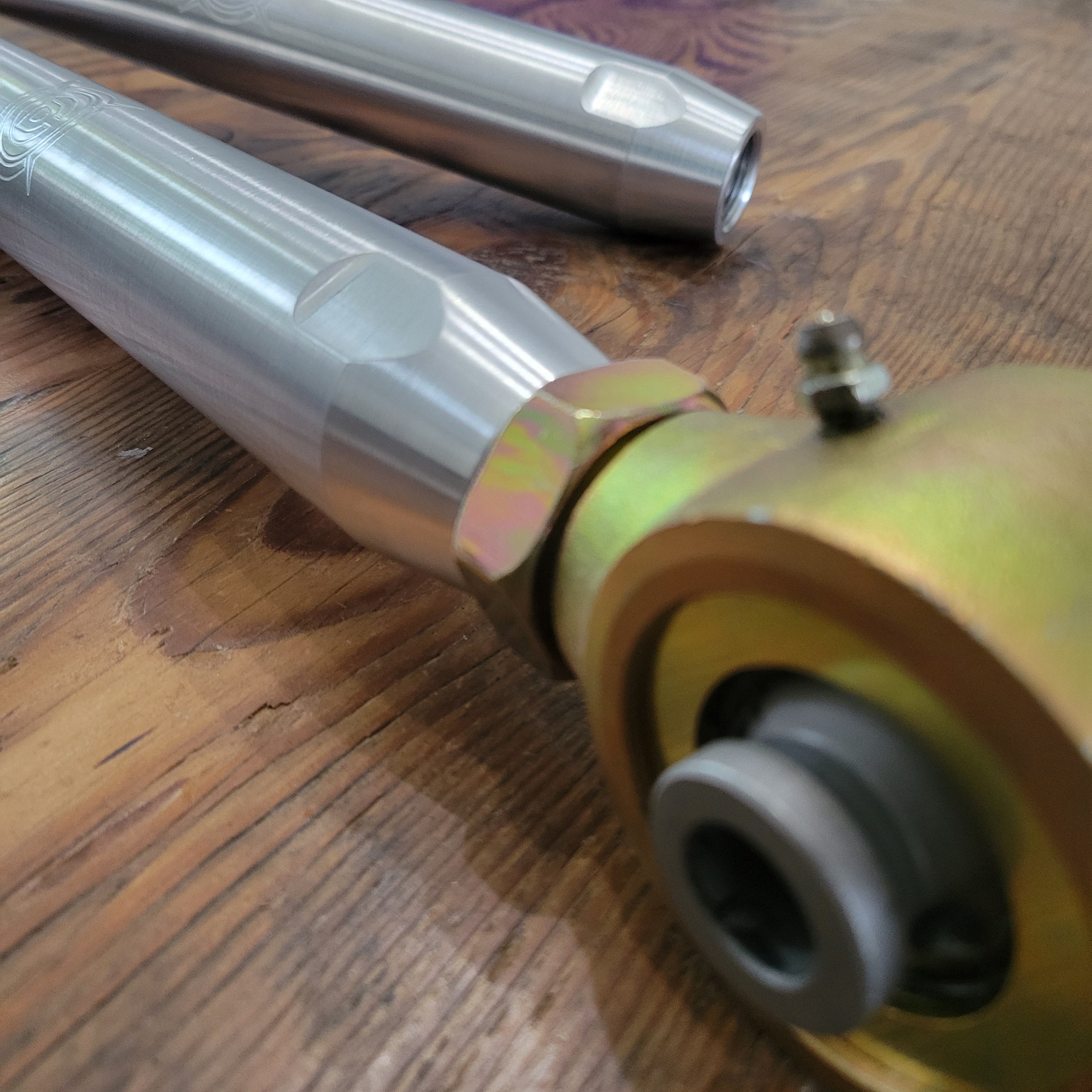 Overland Custom Design lower control arms for 3rd Gen Toyota 4Runner, showing durable metal construction and mounting points
