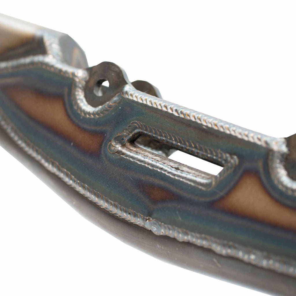 Pair of Riley Mountain Motorsports URC trailing arms, durable metal suspension components for off-road vehicle upgrade.