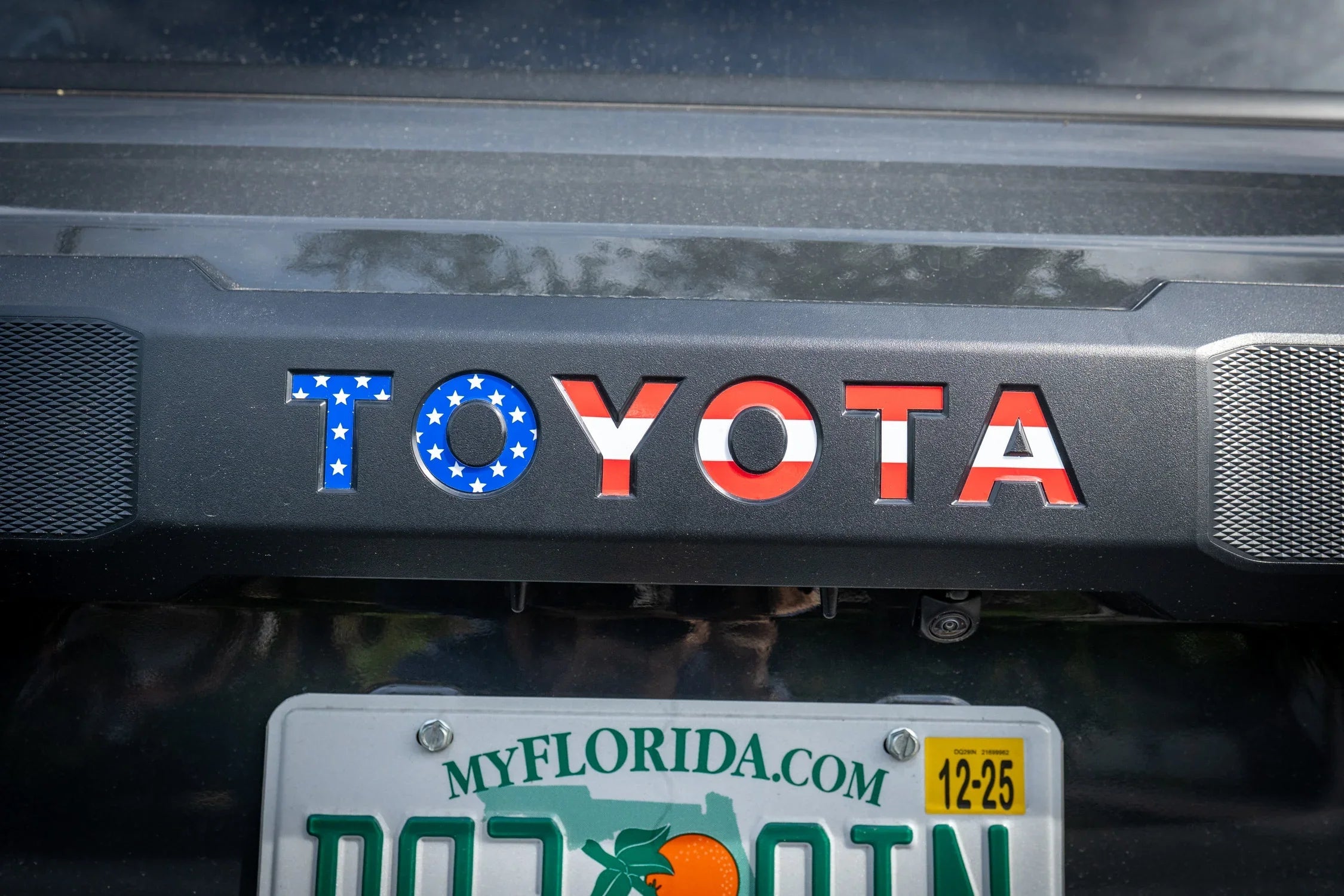 Red, white, and blue Toyota Freedom Series rear hatch liftgate emblem inlays for 2025+ 4Runner, made by StickerFab.