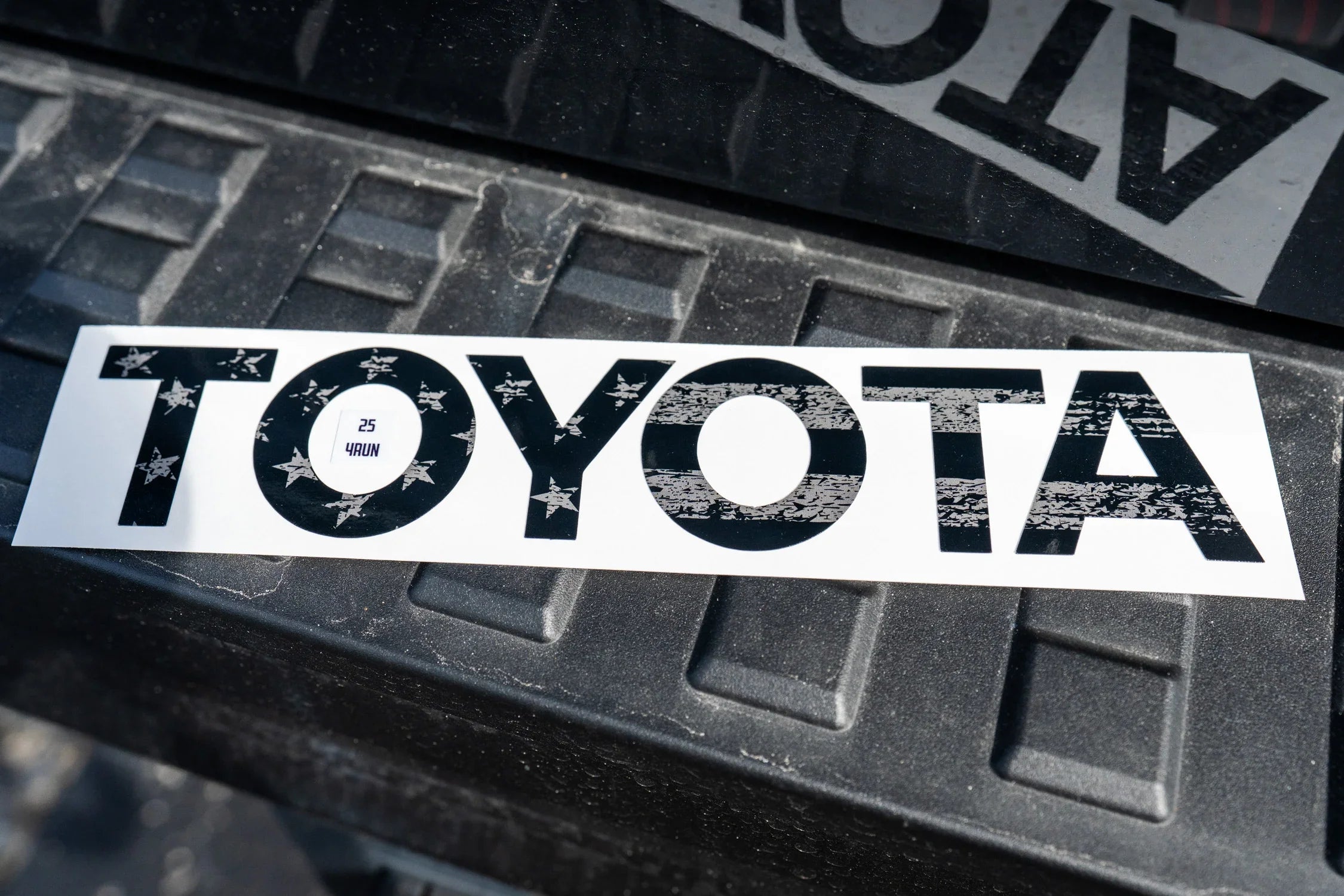 Toyota Freedom Series rear hatch liftgate emblem inlays for 2025+ 4Runner, featuring red, white, and blue design by StickerFab.