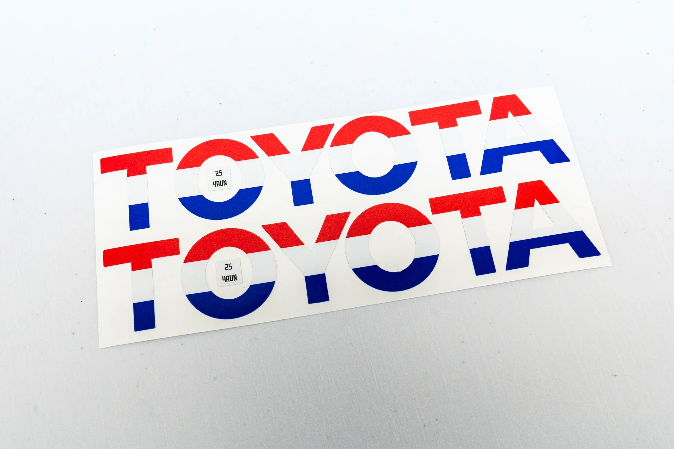 Red, white, and blue Toyota Freedom Series rear hatch liftgate emblem inlays for 2025+ 4Runner by StickerFab.