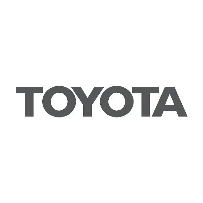 White Toyota Land Cruiser front grille emblem overlays by StickerFab, designed for 2024+ models.