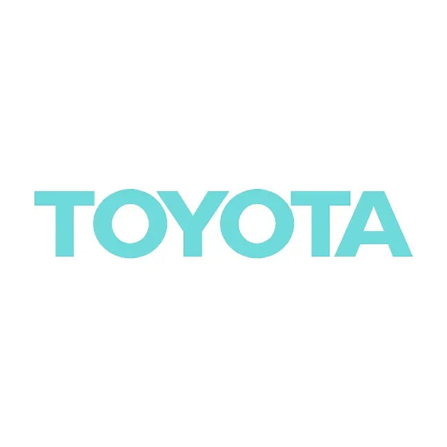 White Toyota front grille emblem overlays for 2024+ Land Cruiser by StickerFab, showcasing sleek design on vehicle grille.