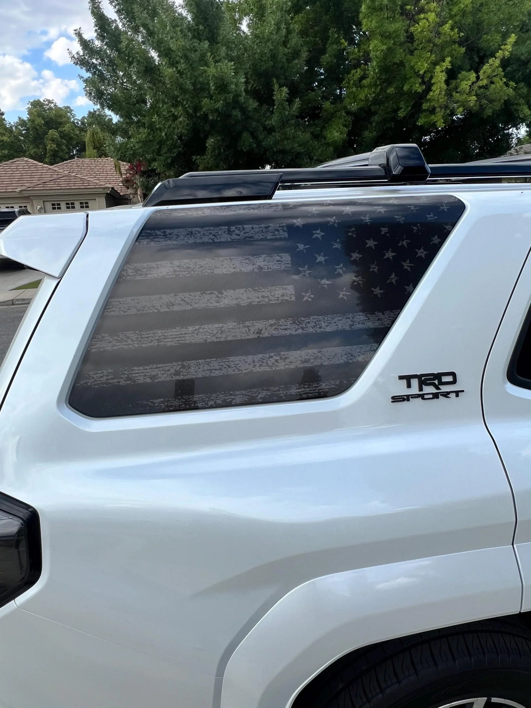 Perforated American flag rear window overlay vinyl for 2025+ Toyota 4Runner, exterior decal by StickerFab.
