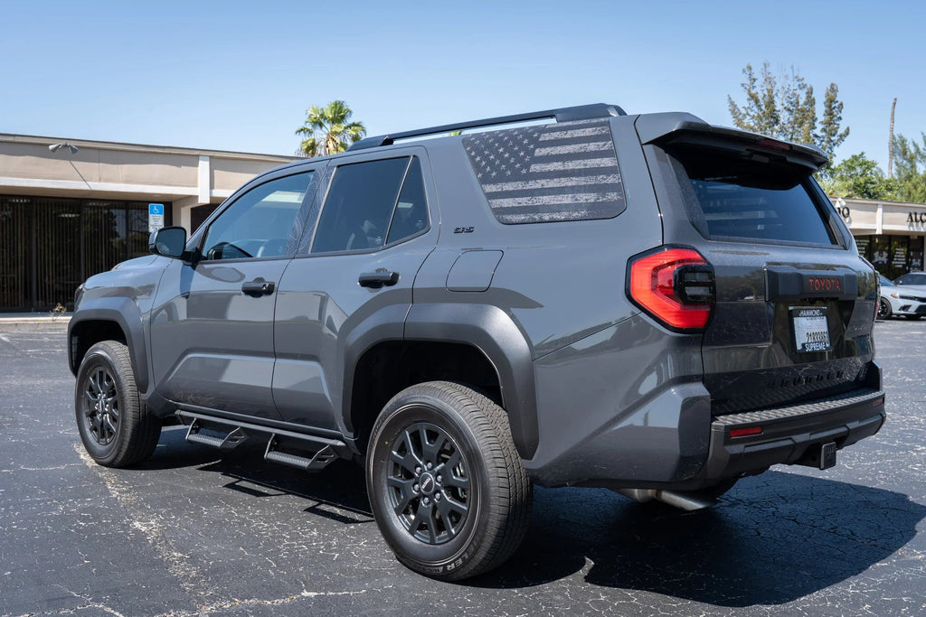 Perforated American flag rear window overlay vinyl decal for 2025+ Toyota 4Runner by StickerFab, featuring gray and black flag design