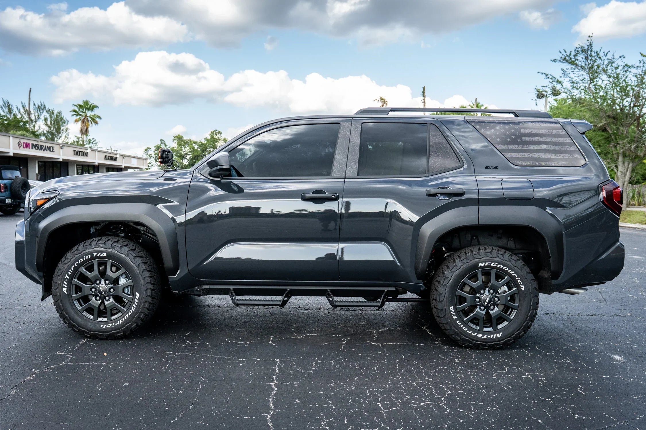 Vinyl topographic rear vent window overlay for 2025+ Toyota 4Runner, perforated gray exterior decal by StickerFab.