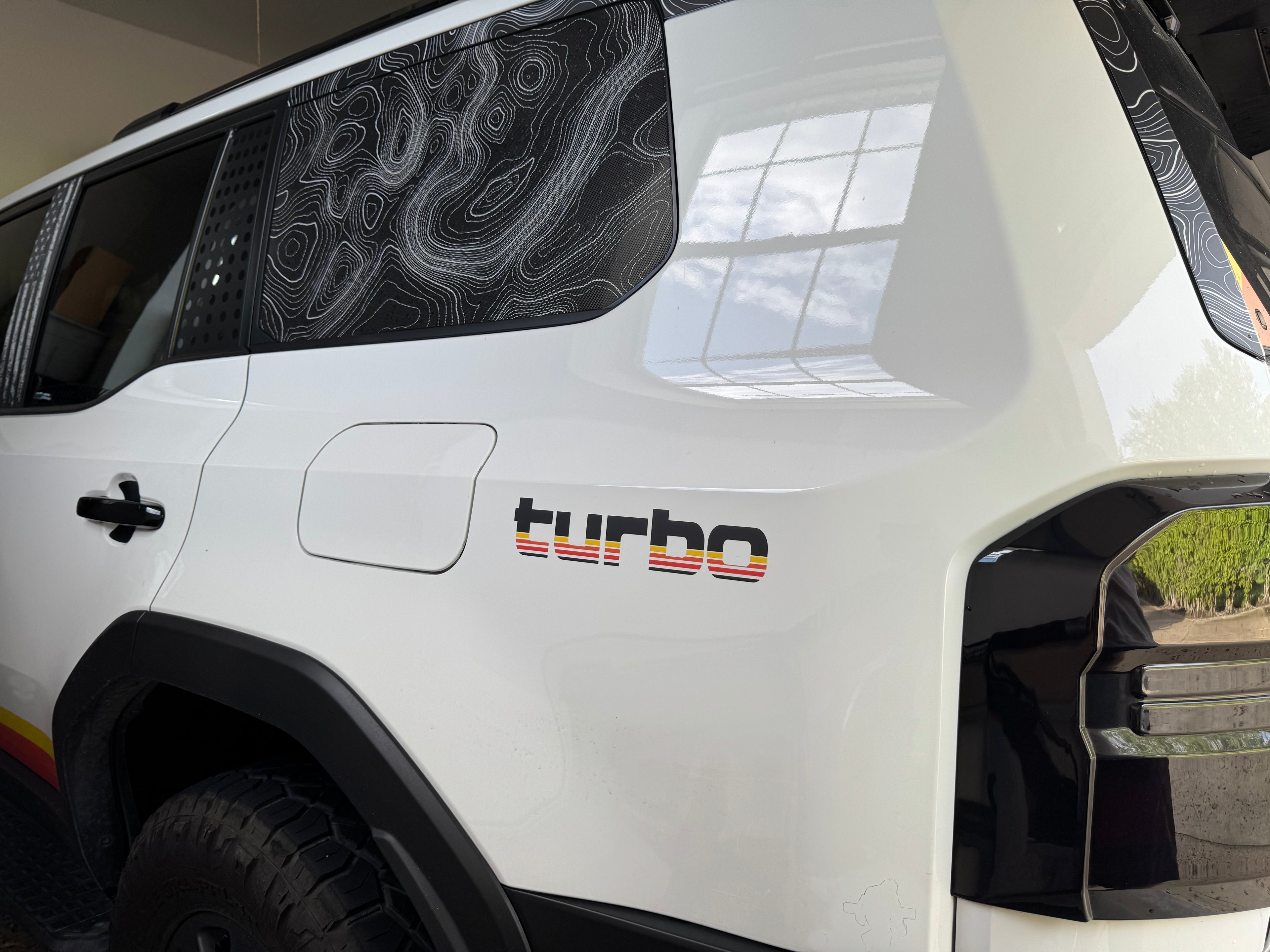 Pair of Matte Black Turbo Retro Style Graphic Fender Decals by StickerFab for vehicle exterior vinyl customization