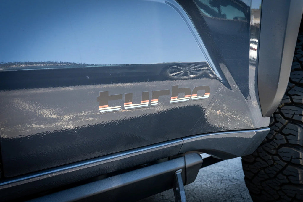 Pair of black vinyl Turbo Retro Style Graphic Fender Decals by StickerFab for universal vehicle exterior decoration