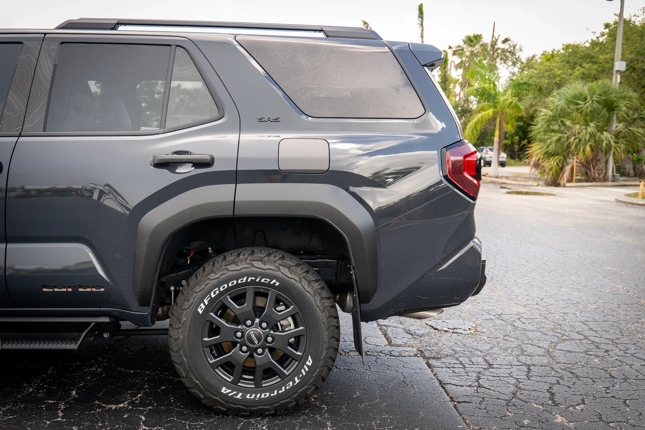 Pair of matte black Turbo Retro Style Graphic Fender Decals by StickerFab for vehicle exterior vinyl decoration.