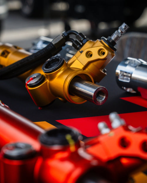 Toyo-Steering billet Tundra conversion rack kit installed on a 2016-2023 Toyota Tacoma, showcasing matte finish and stock length.