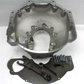 Vinyasa Automotive bell housing adapter kit, includes metal components and gaskets for seamless engine transmission connection.
